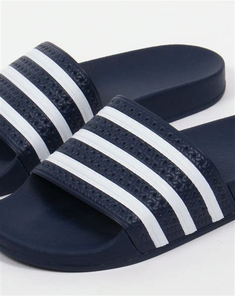 adidas adilette slides.